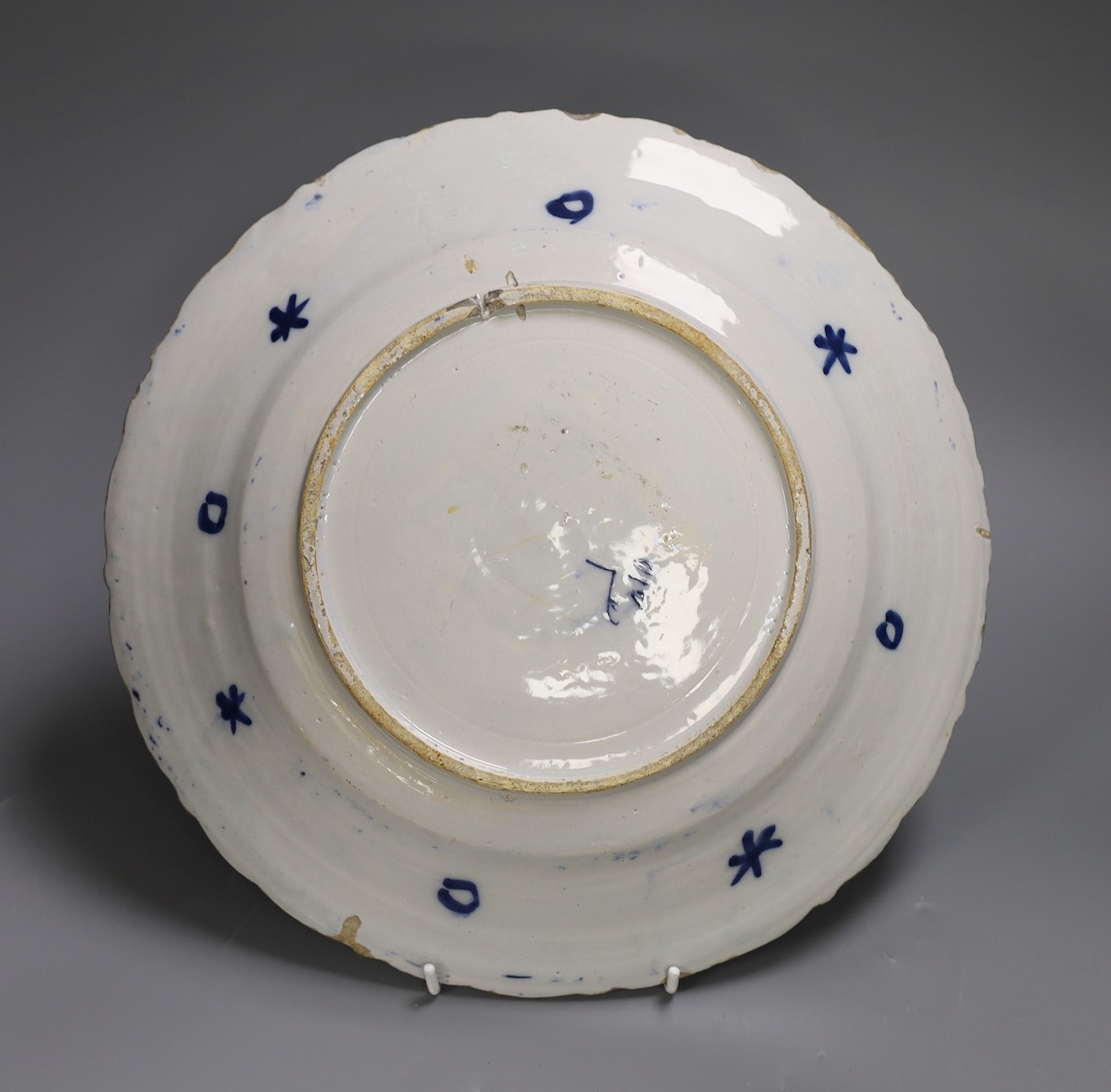 A mid 18th century Delft blue and white ‘flower urn’ dish, Claw Factory, 31cm